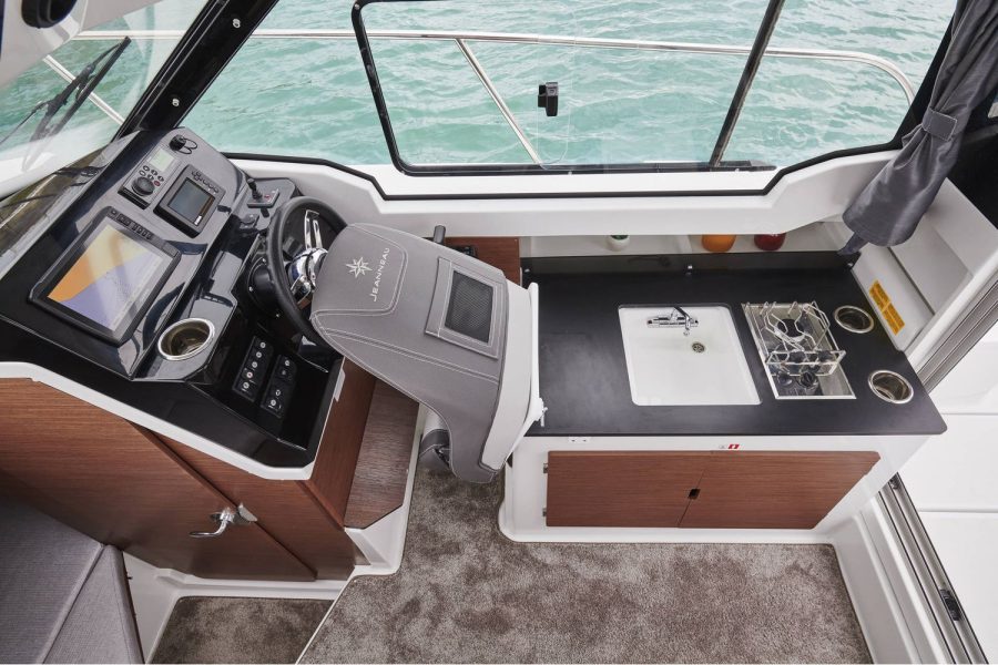 Jeanneau Merry Fisher 795 - fishing boat / cruiser - helm seat tilts forward for access to galley