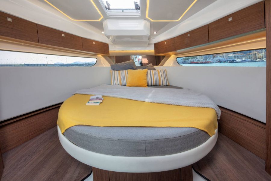 Jeanneau Merry Fisher 1095 - main cabin with double berth and hatch to deck