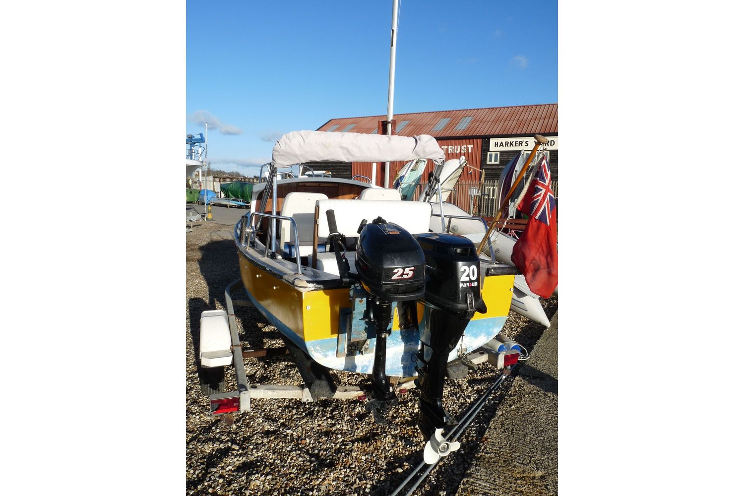 16ft traditional fishing cuddy - main and aux outboard engines