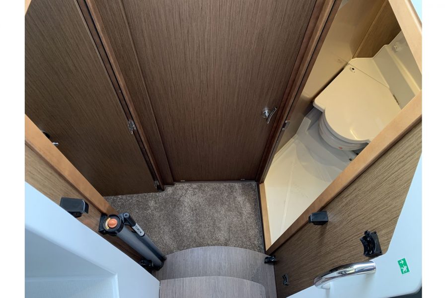 Jeanneau Merry Fisher 895 - steps down from wheelhouse to cabins and toilet compartment