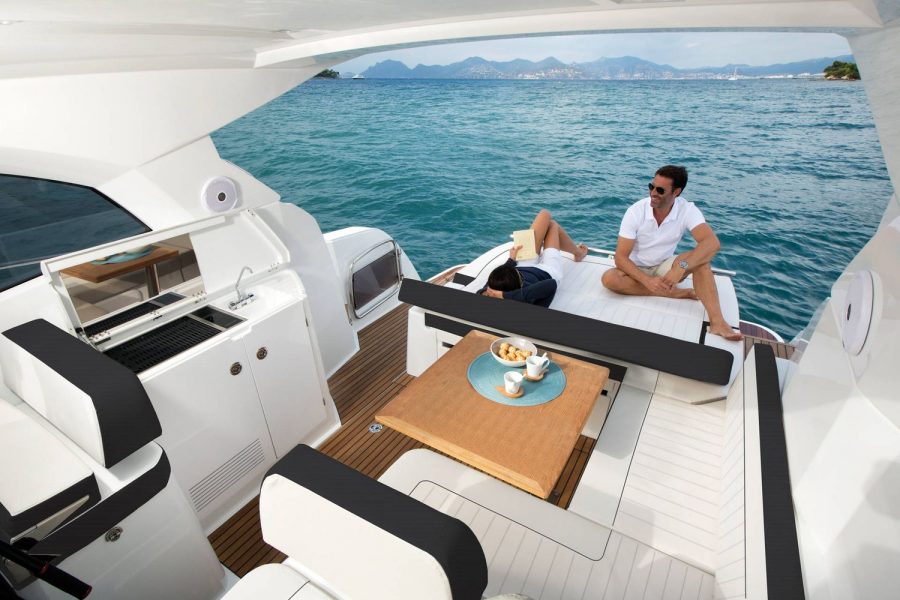 Jeanneau Leader 36 diesel sports cruiser - view from cockpit helm position to aft sun lounger