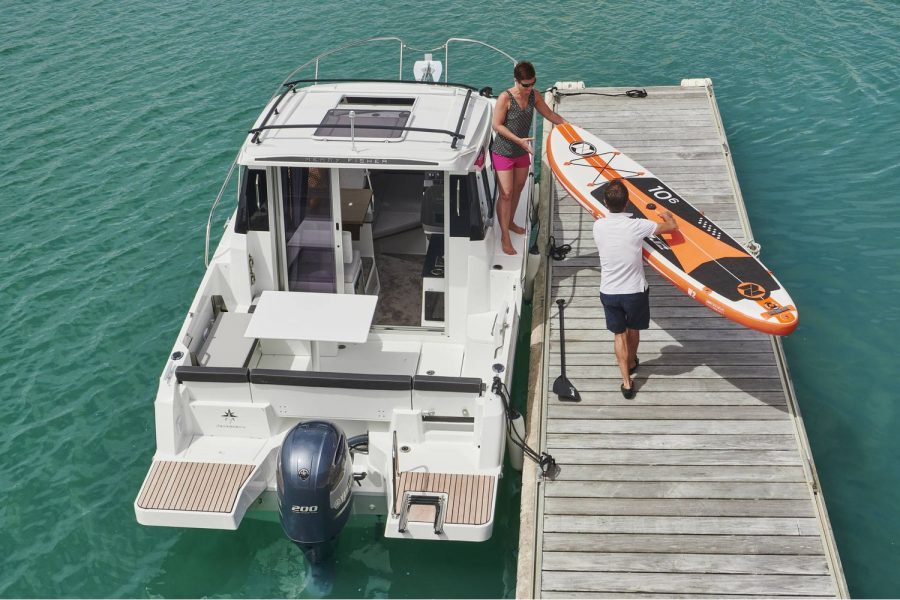 Jeanneau Merry Fisher 795 - on a pontoon with a paddleboard