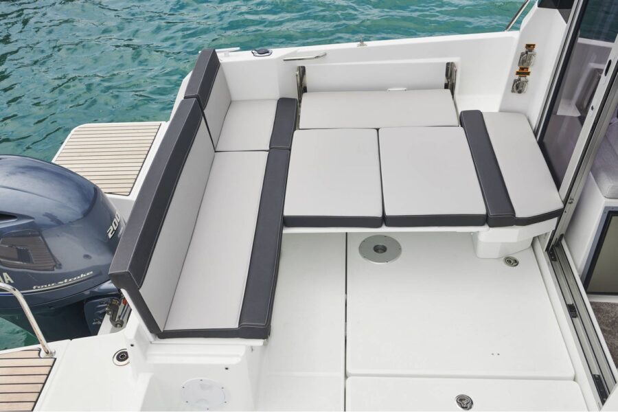 Jeanneau Merry Fisher 795 - aft cockpit seating converts to sun lounger