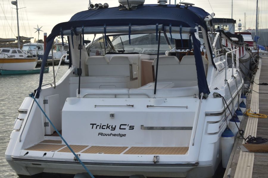 Princess 366 twin diesel sports cruiser - aft swim platform and cockpit with canopy