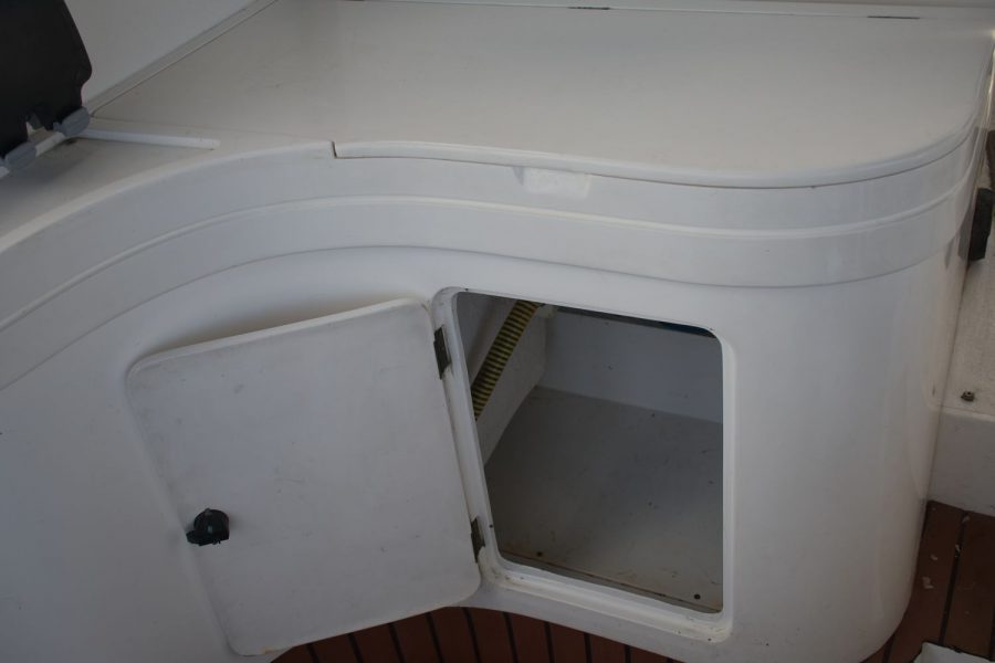 Princess 366 twin diesel sports cruiser - cockpit storage compartment