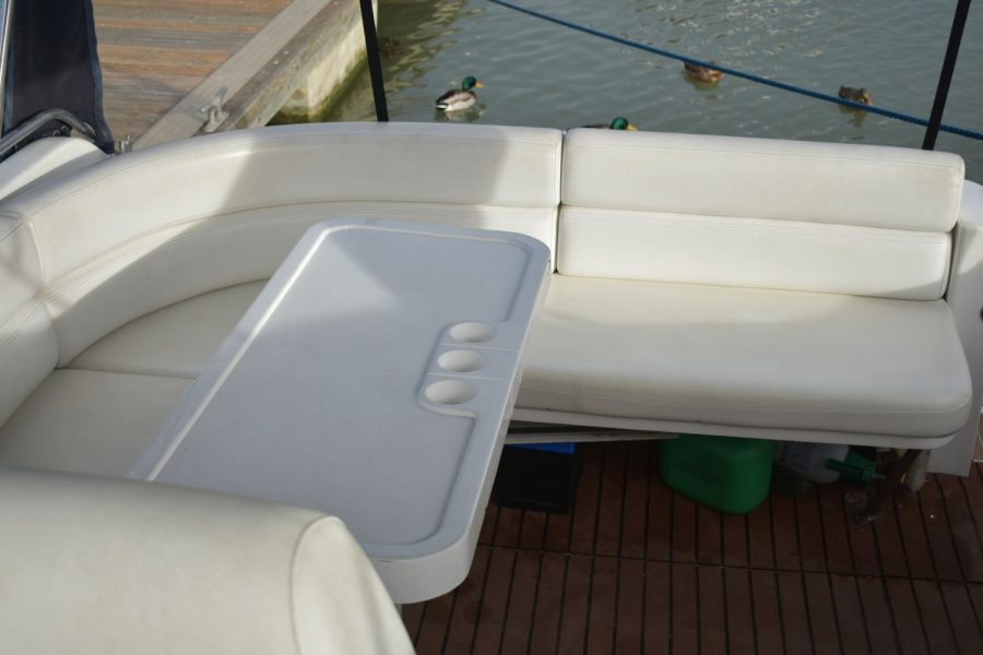 Princess 366 twin diesel sports cruiser - J shaped aft cockpit seating and table
