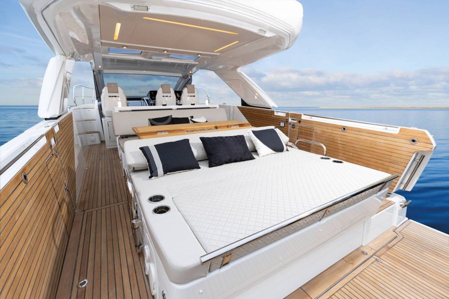 Jeanneau DB 43 inboard day boat - aft sofa converts to large sun lounger