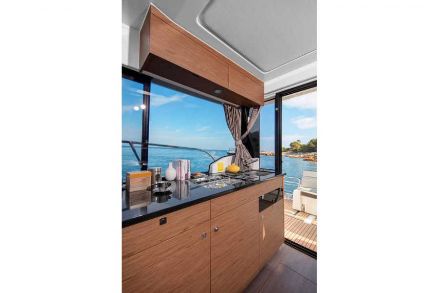 Jeanneau Merry Fisher 1095 - galley and aft sliding door